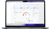 The image shows a laptop displaying a dashboard with various metrics and a progress bar indicating 80%.