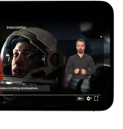The image shows a scene from the movie Interstellar with a character in a space suit and a subtitle that reads (beeping) followed by Armance is hitting stratosphere. There is also a person standing in front of a screen, likely providing commentary or analysis.